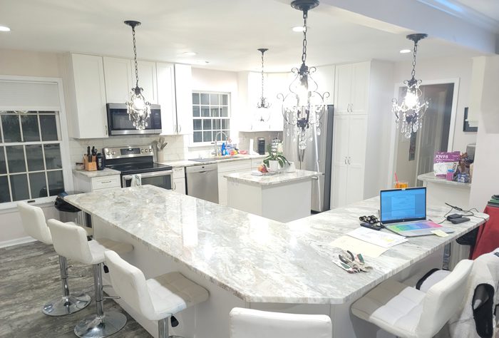 Remodeled Kitchen with white cabinets and Paint